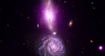 The VV 340 system, which features two colliding galaxies, looks like a giant exclamation mark in space