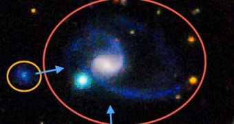 The newly-found galaxy GAMA202627 looks just like the Milky Way, and features two dwarf galaxy companions