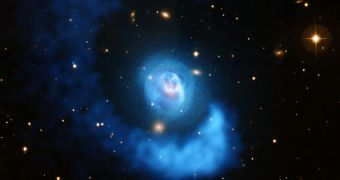 This is a composite view of Abell 2052, made up of data from the VLT and Chandra telescopes
