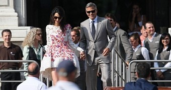 George Clooney kept his wedding ceremony under strict check by issuing his own cell phones and cameras