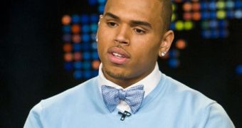 Chris Brown while doing an interview with Larry King