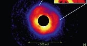 Coronagraphic image of polarized light around the star AB Aurigae