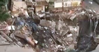 Giant Sinkhole Swallows Whole Apartment Building in China – Video