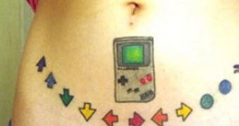 Girl Tattooed Her Abdomen with Code and GameBoy