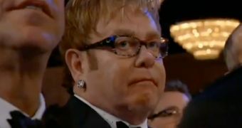 Sir Elton John, looking very unimpressed during Madonna's speech at the Golden Globes 2012