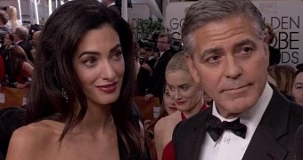 Amal and George Clooney on the red carpet at the Golden Globes 2015