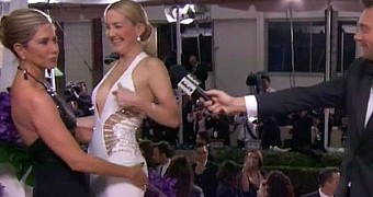 Jennifer Aniston shows appreciation for Kate Hudson's flawless figure at the Golden Globes 2015