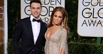 Ryan Guzman and Jennifer Lopez on the red carpet at the Golden Globes 2015