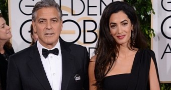 George and Amal Clooney on the red carpet at the Golden Globes 2015
