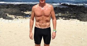 Gordon Ramsay shows off his new figure, which he got training for the Hawaii Ironman