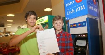 Matthew Hewlett and Caleb Turon with the BMO excuse note for school