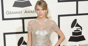 Taylor Swift in a gorgeous and very heavy Gucci dress at the 2014 Grammy Awards