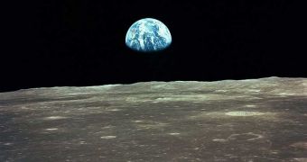 Image of an Earth-rise seen from the surface of the Moon taken during an Apollo mission