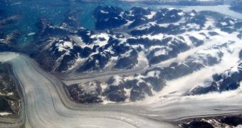 An aerial photo of glaciers in Greenland, seen here moving towards the Atlantic Ocean