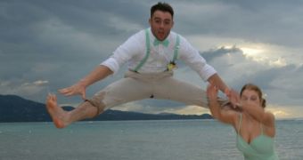 Photo captures the moment a groomsman rips his pants and kicks a bridesmaid in the head while doing a split in the air