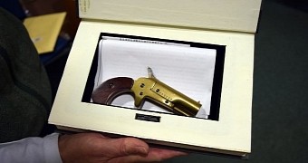Goodwill store employee finds gun hidden inside donated book