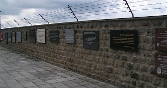 Commemorative plaques on the inside "Wailing Wall" at Mauthausen camp