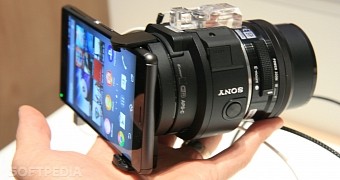 Sony ICLE-QX1 E-Mount Interchangeable lens camera attached to a smartphone