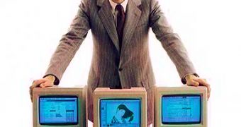 Young Steve Jobs, posing proud with three Macintoshes