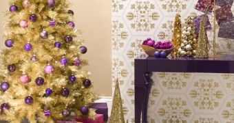 Interior designers dare us to be bold this year by going all gold and purple for Christmas