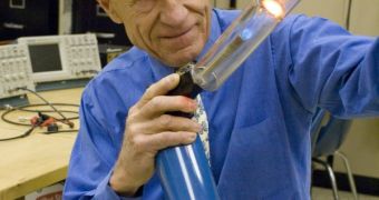 Orest Symko demonstrates how heat can be converted into sound by using a blowtorch to heat a metallic screen inside a plastic tube, which then produces a loud tone, similar to when air is blown into a flute.