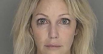 Heather Locklear was charged with hit-and-run after failing to report crash to the police (2008 booking photo)