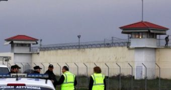 Guards and police are photographed in front of the Trikala prison, in central Greece