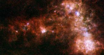 Herschel/Spitzer image of the Small Magellanic Cloud, displaying gas distribution and temperatures