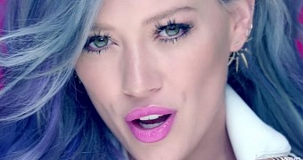 Hilary Duff rocks new hair and a new attitude in “Sparks” official music video