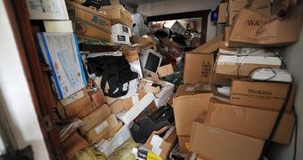 A man was trapped underneath piles of garbage, which he had stored