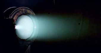 An experimental ion thruster, while still in ground testing