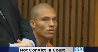 Jeremy Meeks is very unhappy about having his picture taken in inmates’ orange jumpsuit