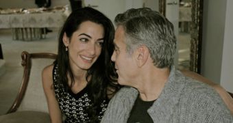 George Clooney lovingly gazes into the eyes of Amal Alamuddin, the woman who got him to walk down the aisle