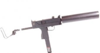 Heavy machine pistol with suppressor
