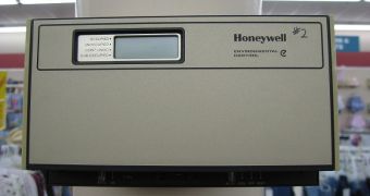 A Honeywell electronic thermostat in a retail store
