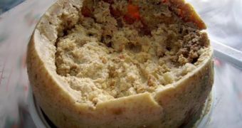 Casu marzu hailing from Sardinia is also known as “rotten” and “maggot cheese”