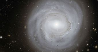 NGC 4921, as seen in this Hubble superimposed image