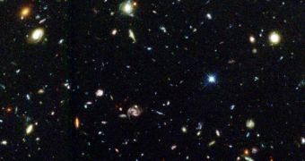 A portion of the Hubble Deep Field, occupying a part of the night skies smaller than 1/12th of the surface of the Moon
