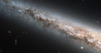 This is Hubble's latest view of the Needle Galaxy's disk