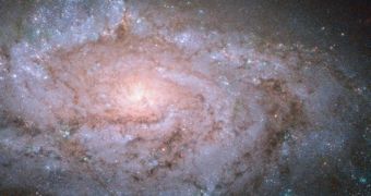 Hubble images non-barred spiral galaxy NGC 1084 in all its splendor