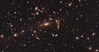 This is the galaxy cluster MACS J1206, whose light is distorted by dark matter