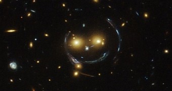Galaxy cluster looks like a cosmic emoticon