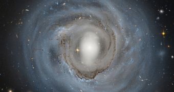 NGC 4921 is a spiral galaxy located in the Coma Cluster