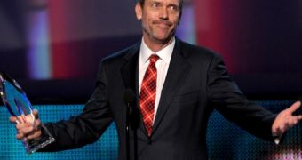 Hugh Laurie says working on hit medical drama “House M.D.” put a strain on his marriage