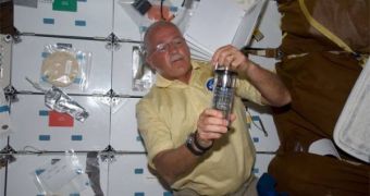 Discovery STS-119 mission specialist John Phillips worked on an Astrogenetix Salmonella vaccine experiment in March 2009
