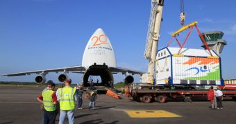 The Hylas-1 container is seen here during unloading operations in French Guyana. A massive Antonov airplane is visible in the background