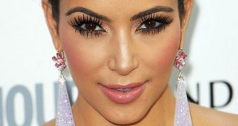 Kim Kardashian says she still believes in love, despite divorce