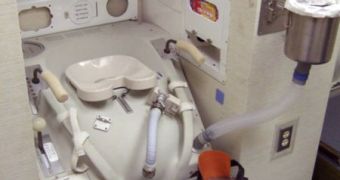 A mock-up of the new toilet aboard the ISS, located at the Kennedy Space Center