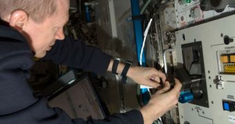 ISS Crew Busy with Experiments, Cargo Transfers