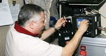Cosmonaut and Flight Engineer Fyodor Yurchikhin works inside the Zvezda service module